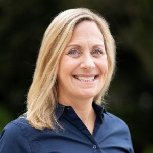 Woman smiling.
