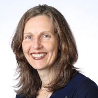 Woman smiling for camera.